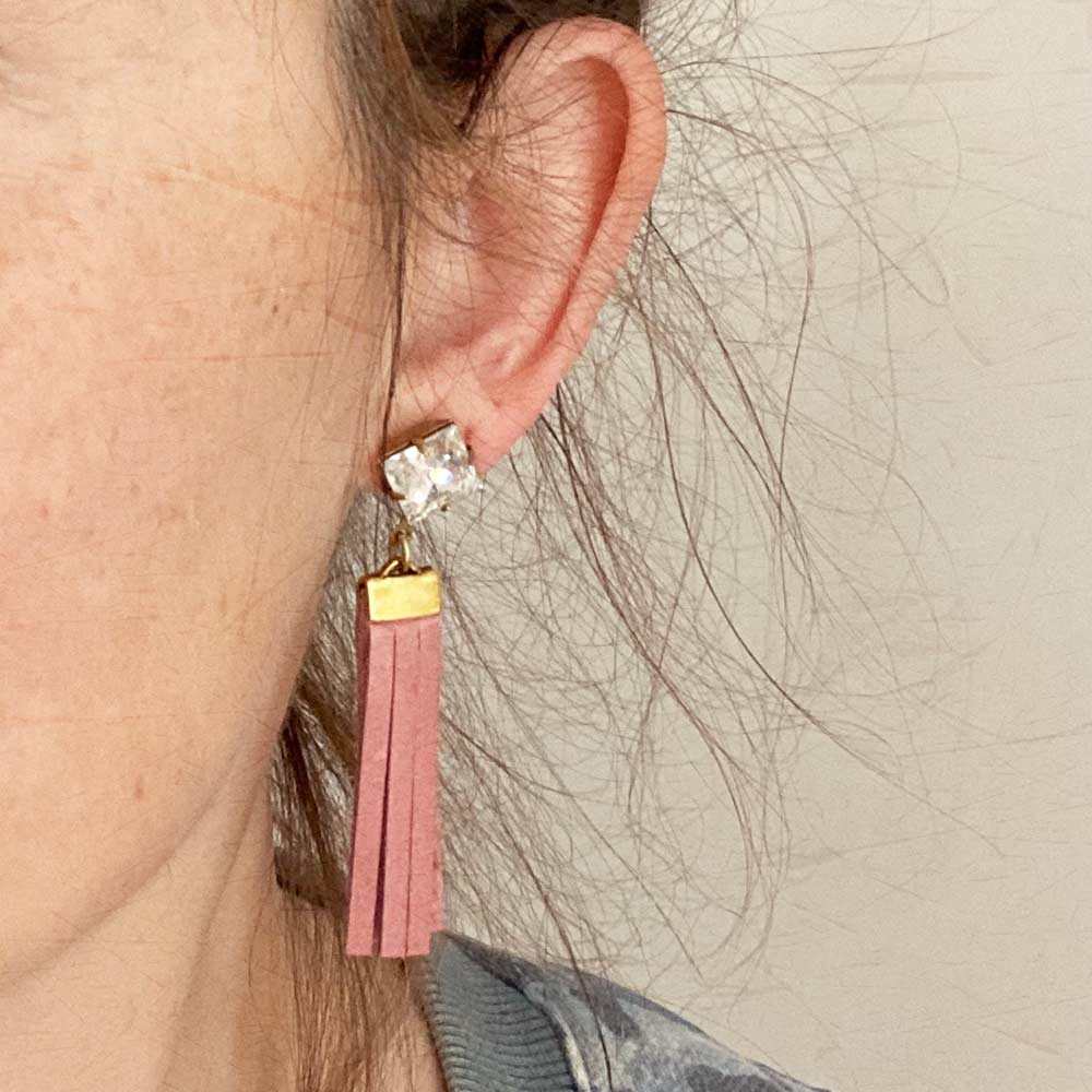 alt="blush leather tassel earrings"