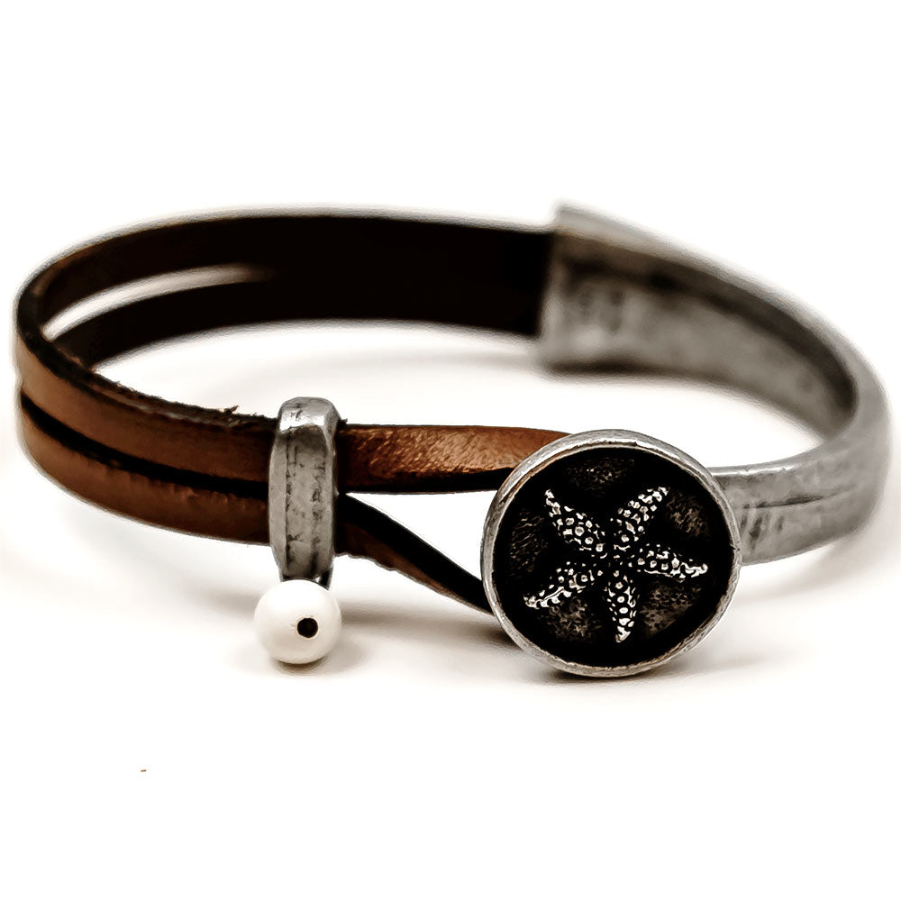 alt="Silvertone Leather Starfish Cuff Bracelet"
